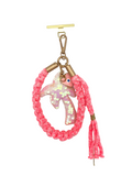 Grigri en macramé rose fluo