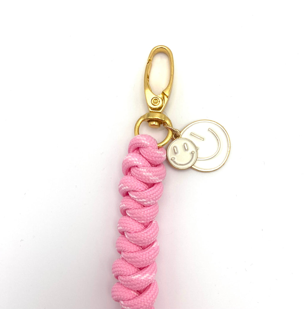 Porte clés et accessoire de sac ou téléphone smileys en paracorde rose