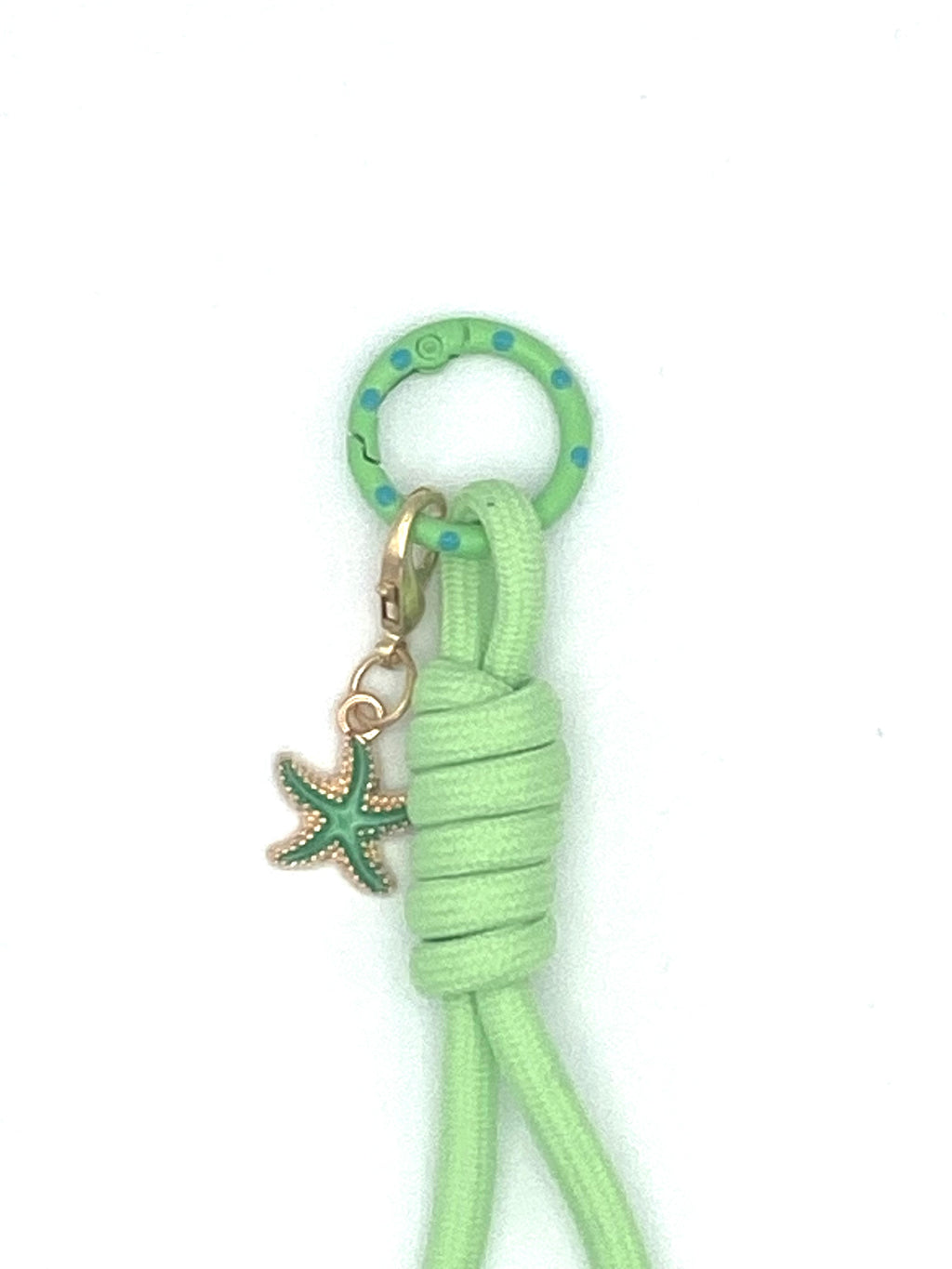 Porte clés en macramé vert avec étoile de mer