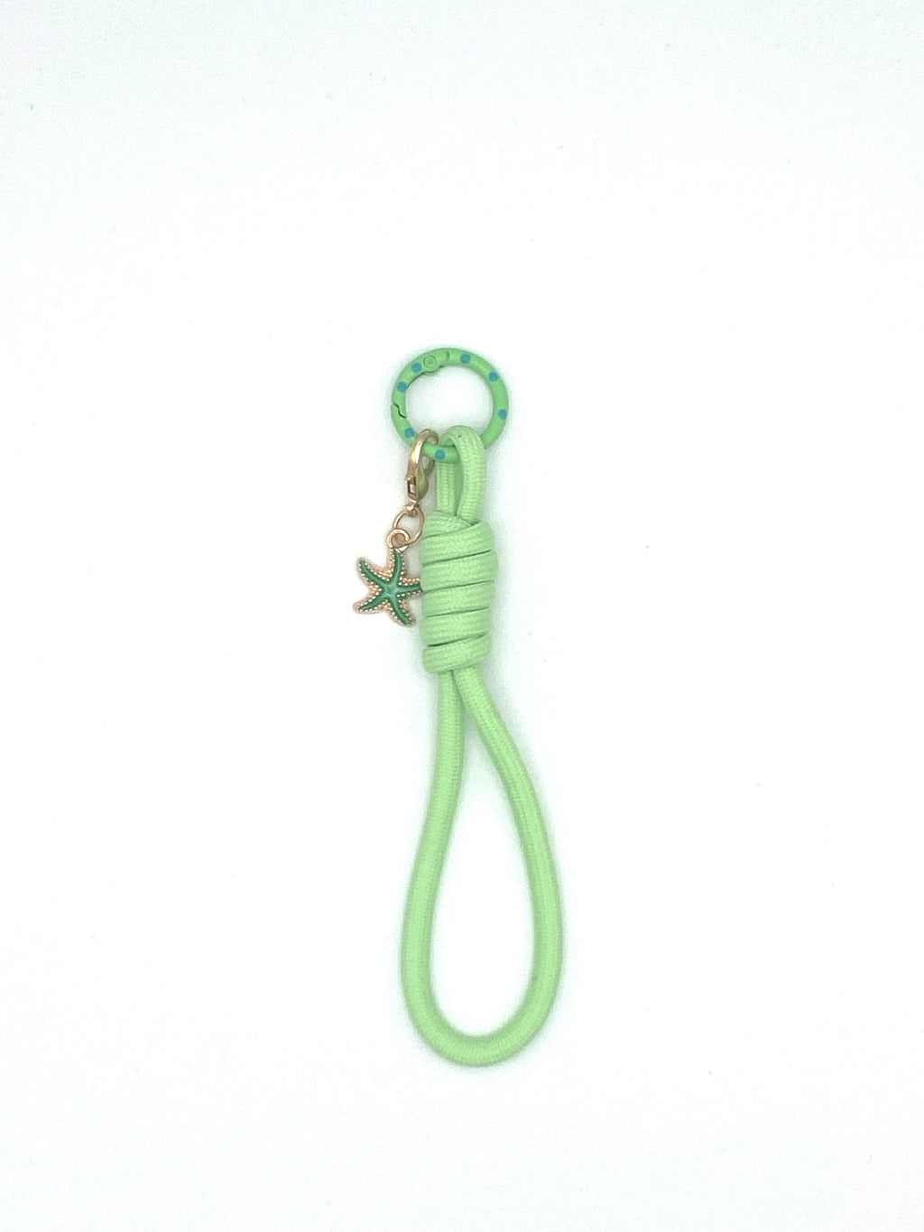 Porte clés en macramé vert avec étoile de mer