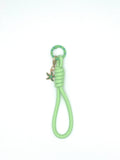 Porte clés en macramé vert avec étoile de mer