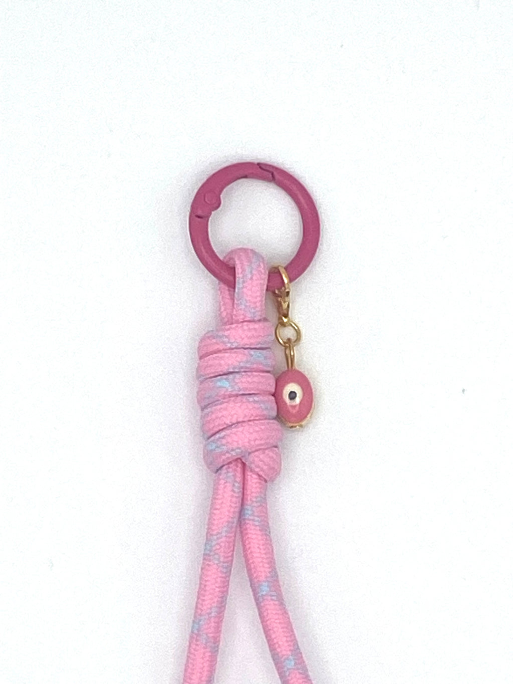 Porte clés en macramé rose et bleu avec oeil