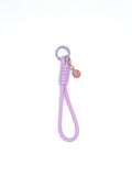 Porte clés en macramé mauve avec coquillage