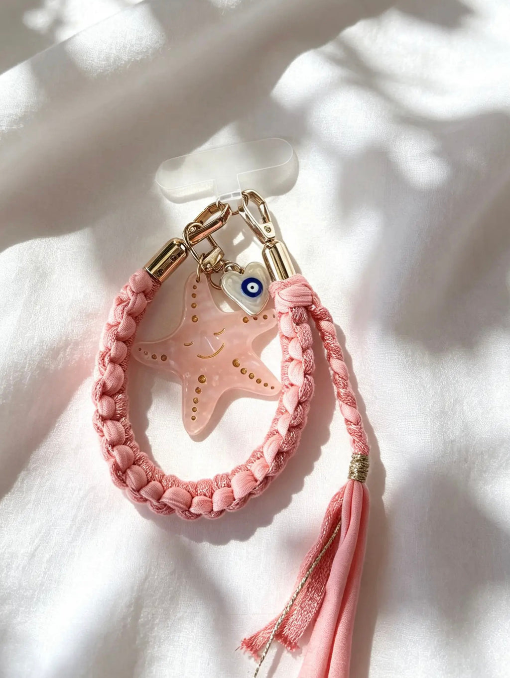 Grigri de téléphone, sac et clés en macramé saumon. Fait main en France