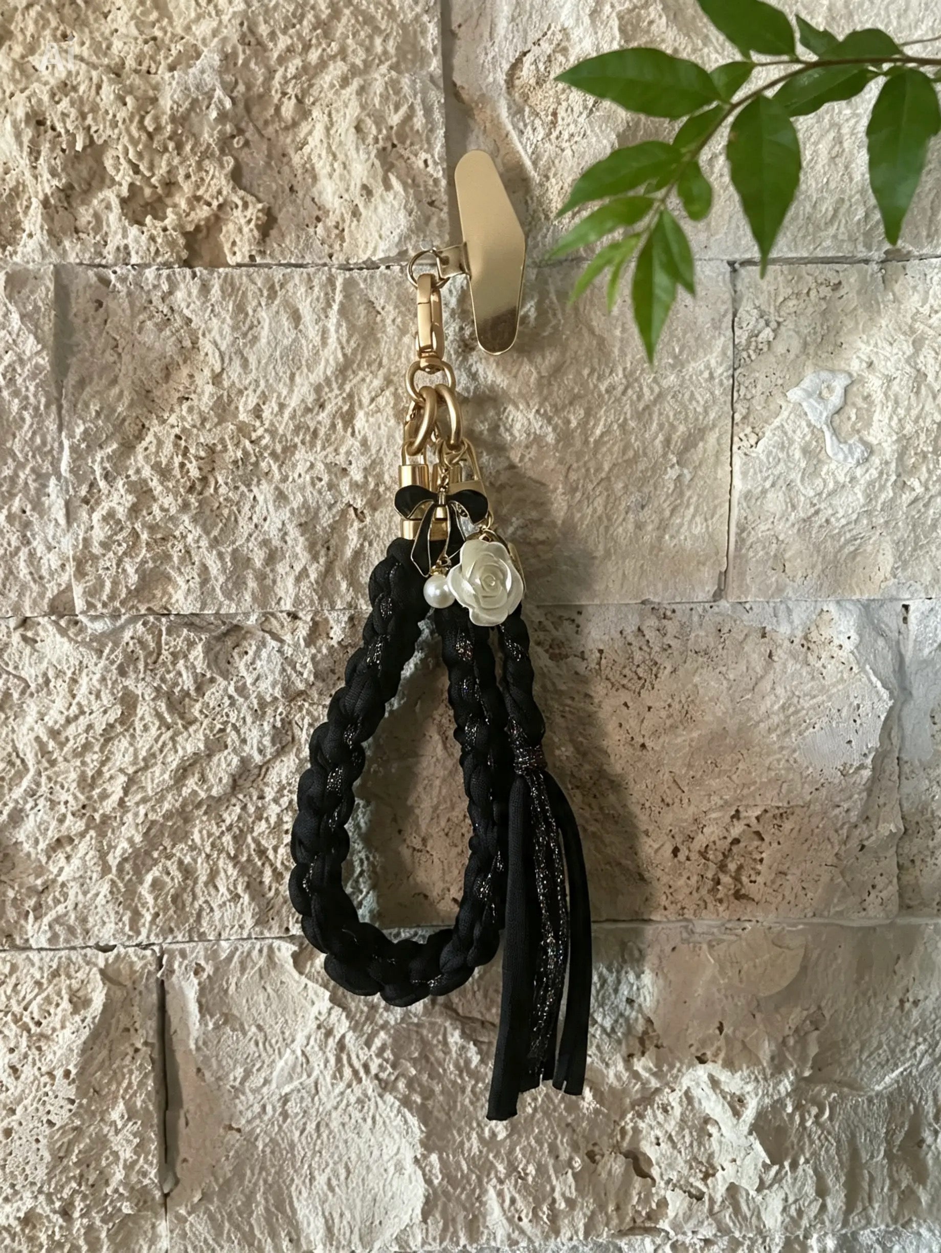 Grigri en macramé noir et lurex