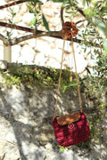 Sac bandoulière au crochet bordeaux