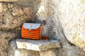 Mini pochette au crochet orange