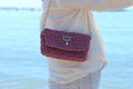 Petit sac épaule au crochet rose métallique