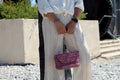 Sac bandoulière au crochet rose métallisé