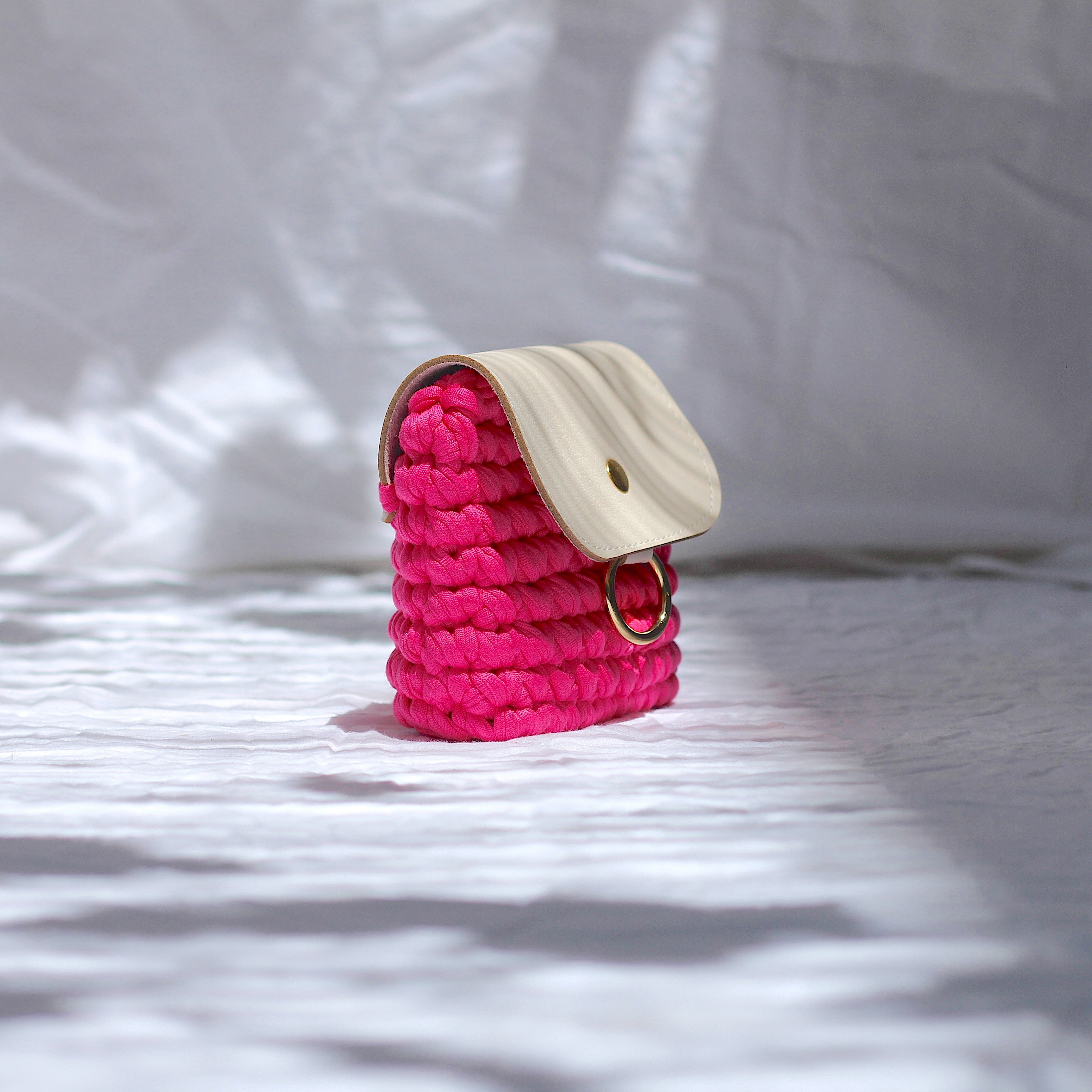 Mini pochette au crochet rose fuchsia
